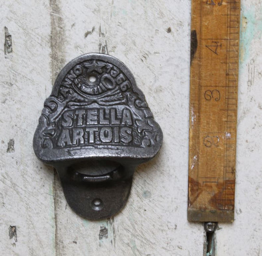 F241.WU Bottle Opener Wall Mounted STELLA ARTOIS Cast Antique Iron